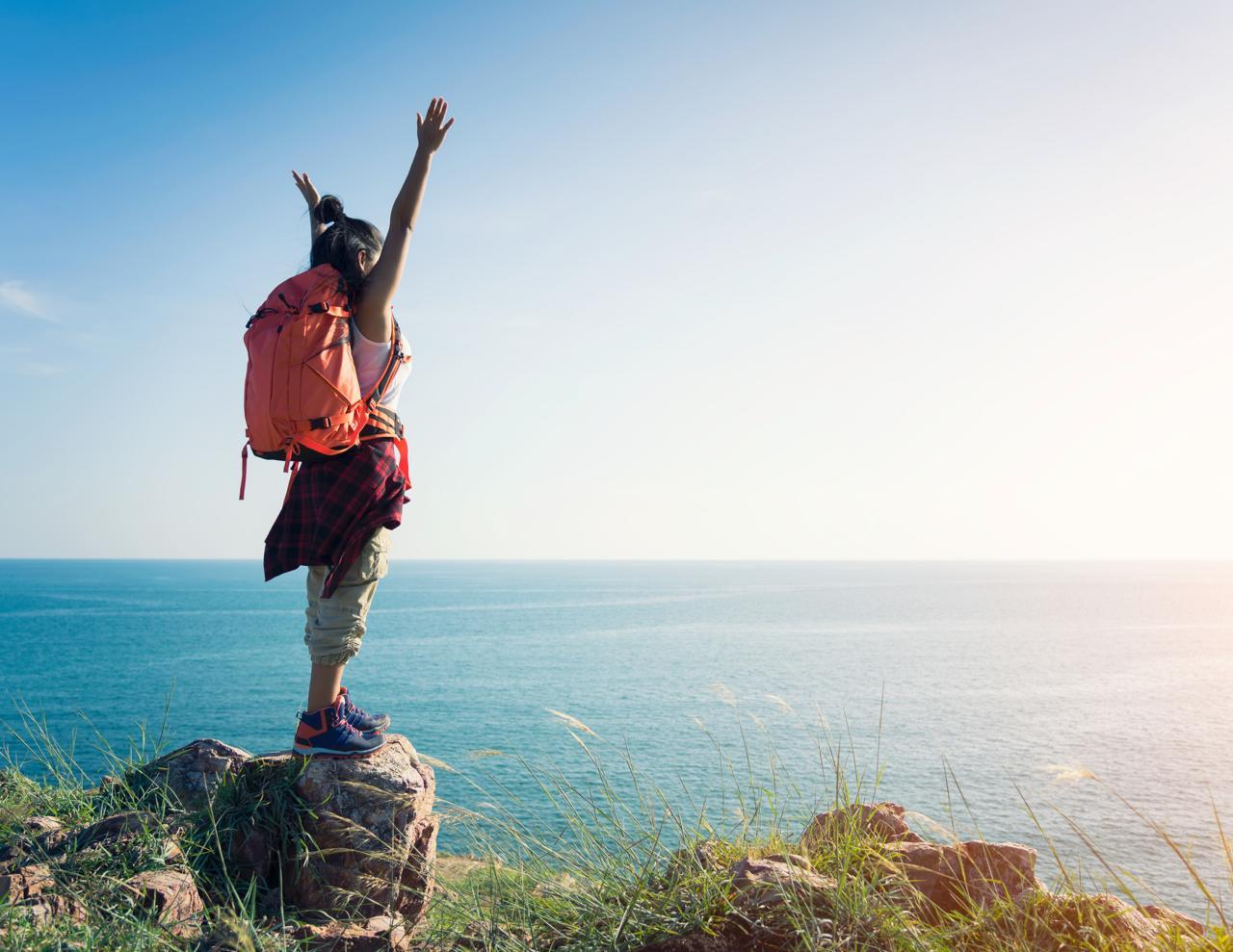 Woman arms wide open, joyful